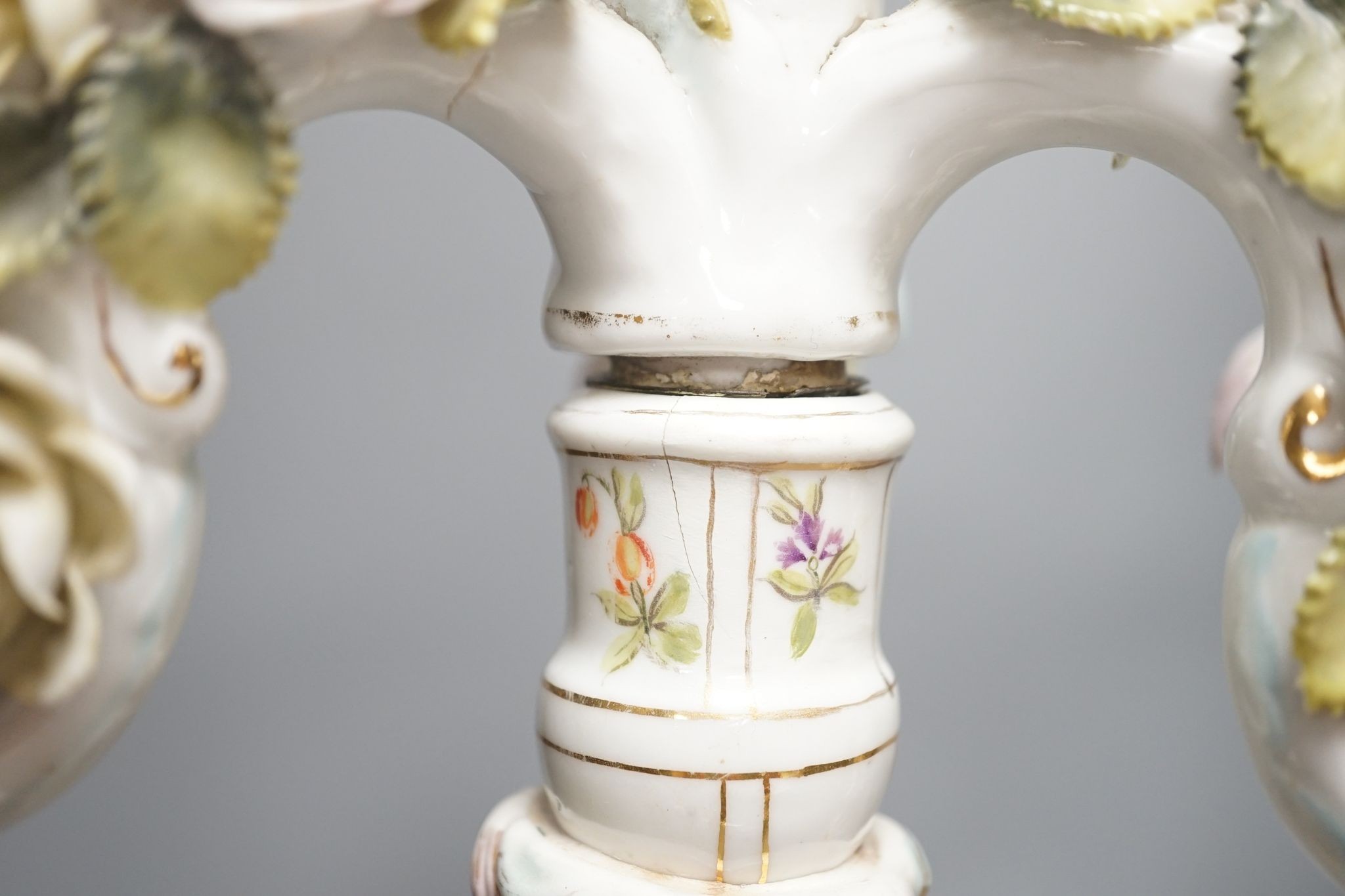 A pair of Sitzendorf 'cherub' candelabra 50cm